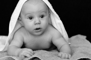 baby in towel B&W